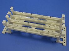 Кросс 100 пар, тип 110, крепление на стену, основание FA-833-100PL2